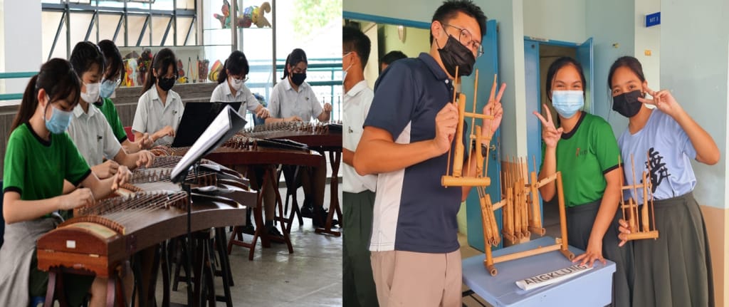 Students wearing masks play guzheng instruments in a classroom; others hold angklung bamboo instruments and pose.
